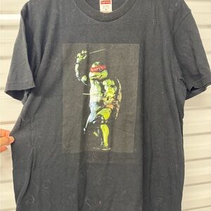 Men’s medium Supreme Raphael Tee